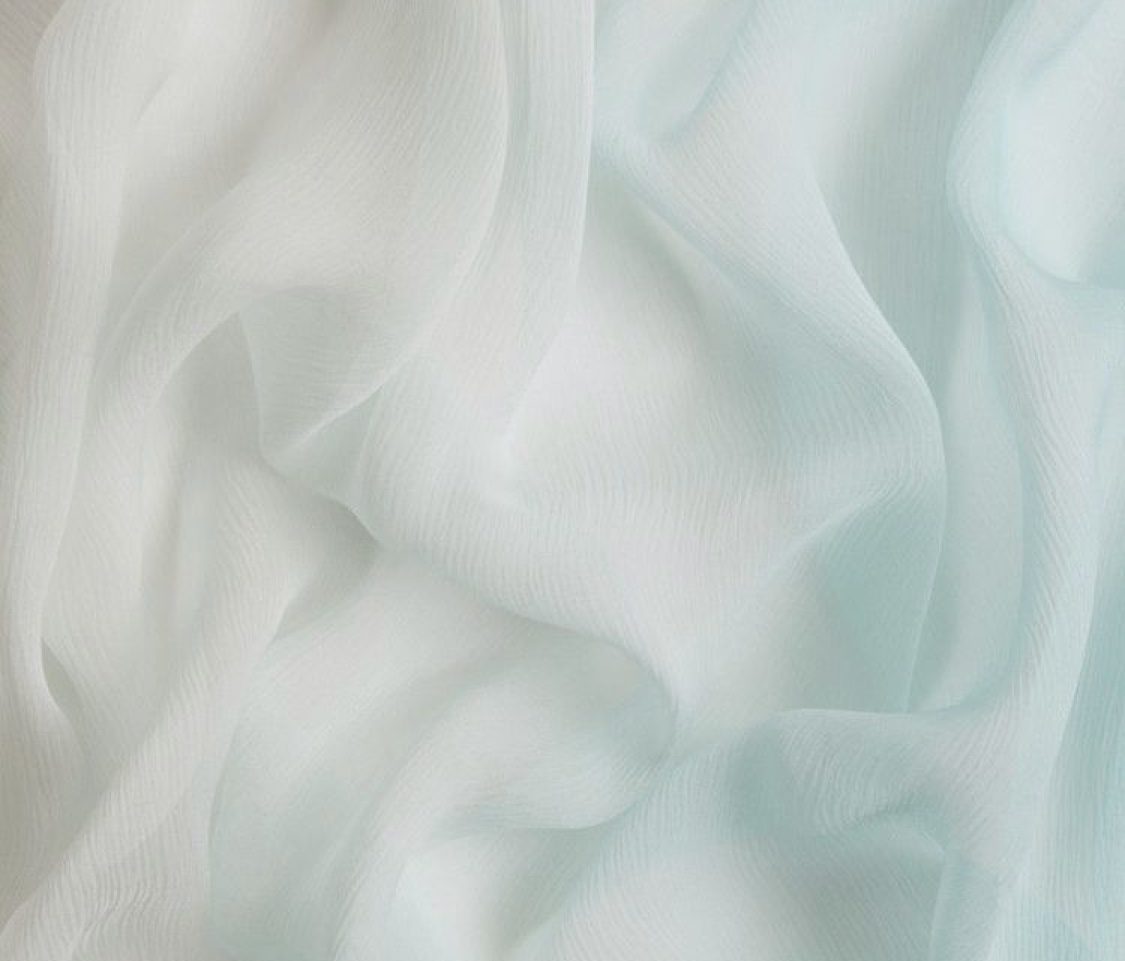 Close-up of fabric and careful stitching